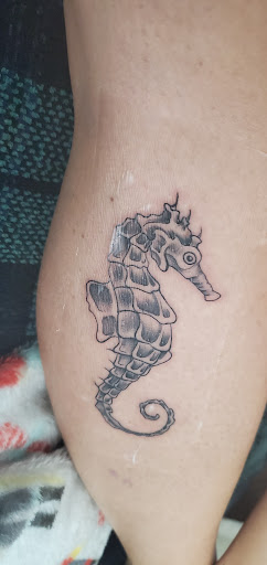 Explore cross stitch tattoo ideas, creative tattoo ideas in Rowlett, available at Sinners Tattoo Studio and Supply