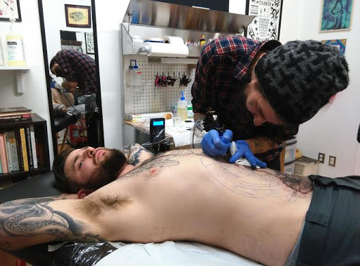 Explore mid arm tattoo ideas, creative tattoo ideas in Perkasie, available at Black Cat Collective