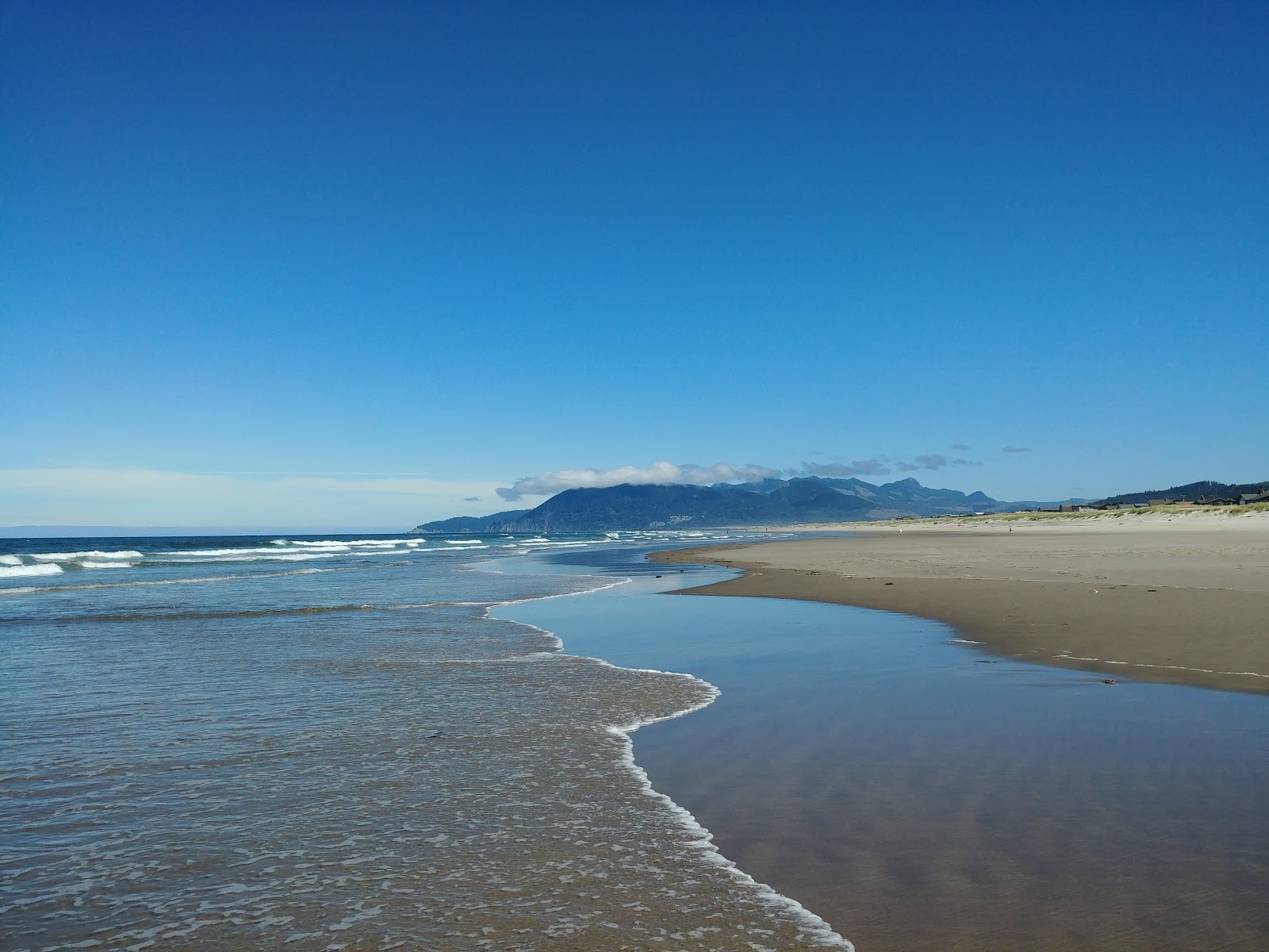 Foto de Manhattan Beach con arena beige superficie