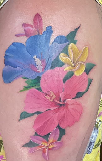 Explore belly tattoo ideas, creative tattoo ideas in Honolulu, available at Tattoolicious Tattoo Waikiki