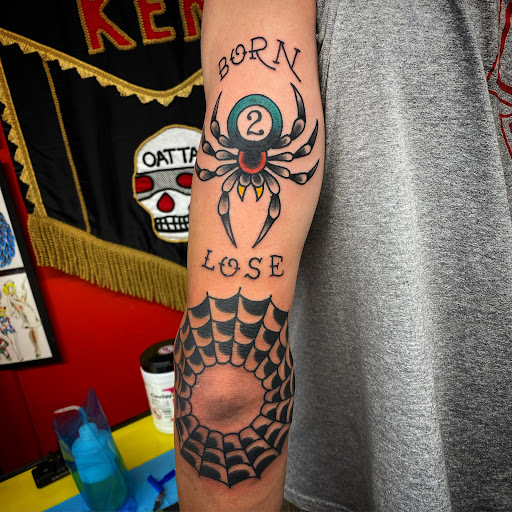 Explore paintbrush tattoo ideas, creative tattoo ideas in Denton, available at Black Anchor Tattoo