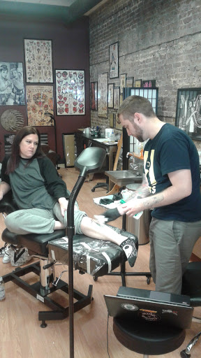 Explore hunting tattoo sleeve ideas, creative tattoo ideas in Seneca, available at Rotation Tattoo