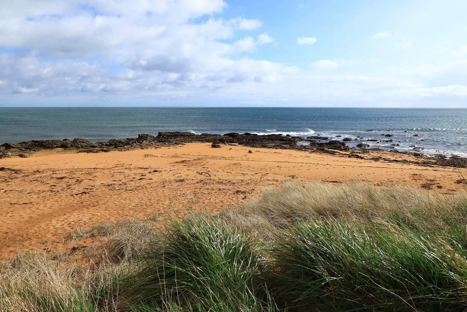 Photo de Red Beach situé dans une zone naturelle