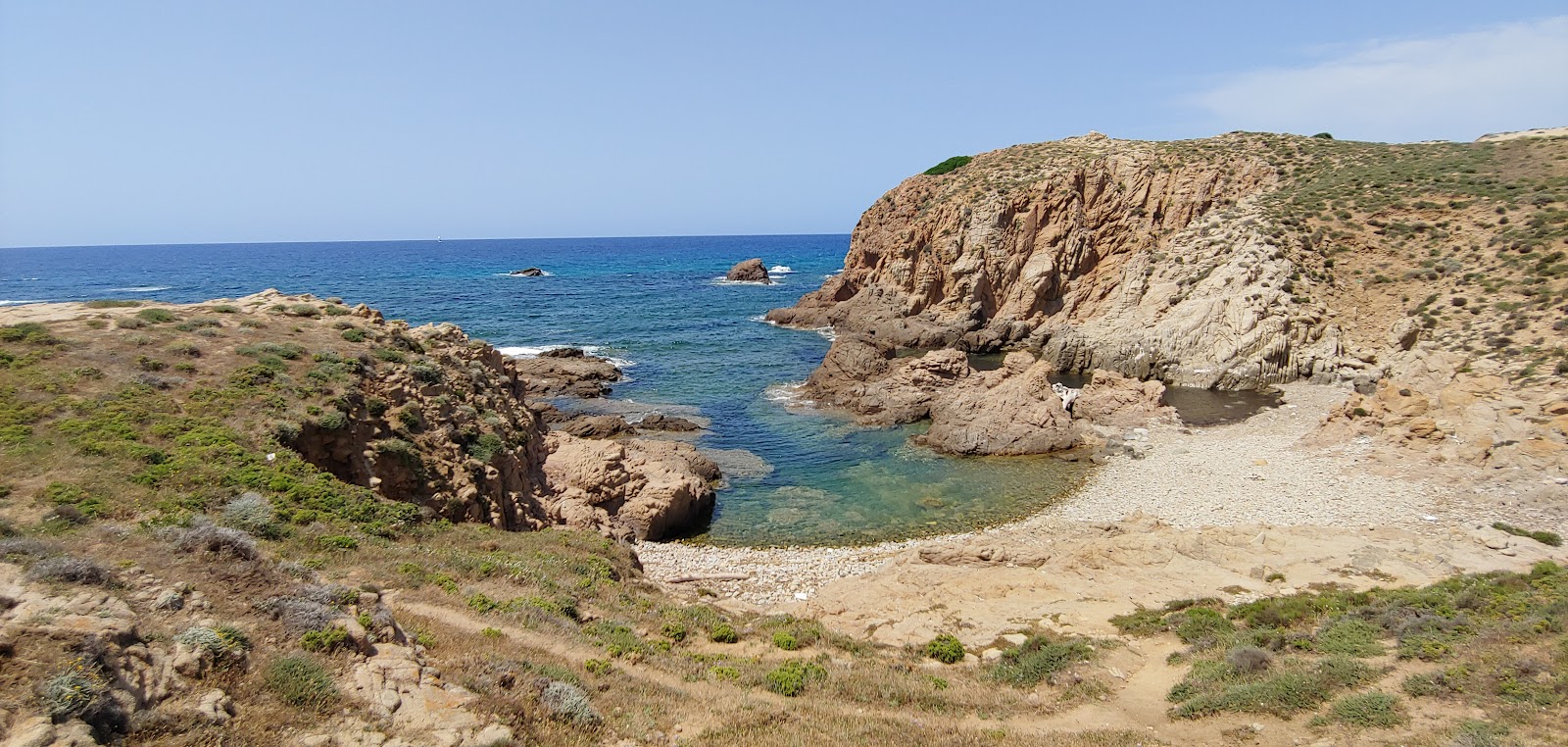 Valokuva Spiaggia di Capo Pecoraista. sisältäen pieni lahti