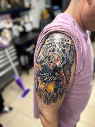 Explore arm tattoo ideas for women, creative tattoo ideas in Sarasota, available at SEVEN SINS Tattoo Studio