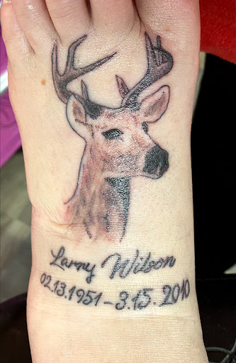 Explore lower leg tattoo ideas male, creative tattoo ideas in Vermillion, available at IKTOMI-INK Tattoo Experience