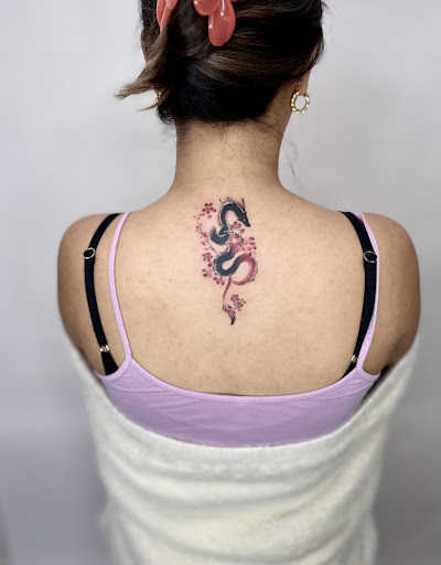 Explore skiing tattoo ideas, creative tattoo ideas in Arcadia, available at Ants Tattoo Arcadia Tattoo Shop