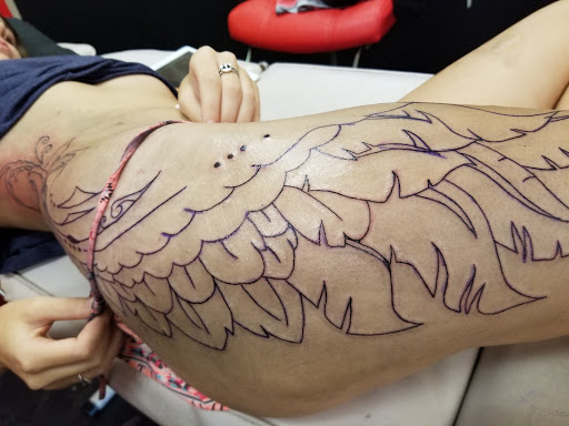 Explore silver line tattoo ideas, creative tattoo ideas in Onalaska, available at Divine Designs tattoo studio