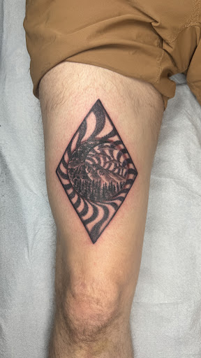 Explore tiny ankle tattoo ideas, creative tattoo ideas in Seattle, available at Hidden Hand Tattoo
