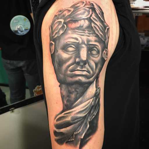 Explore brain cancer tattoo ideas, creative tattoo ideas in Louisburg, available at Lewter Tattoos and Piercing