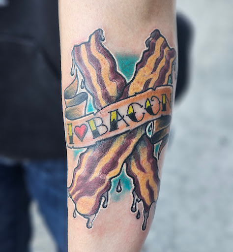 Find fish tattoo ideas for guys for your next unique tattoo in Vancouver at Valkyrie Tattoo & Piercing