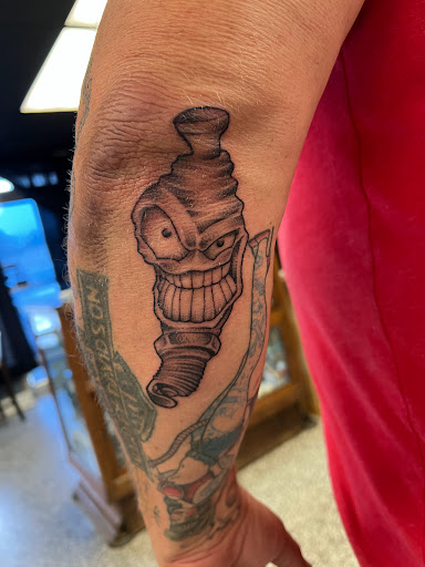 Explore black bird tattoo ideas, creative tattoo ideas in Sanford, available at Luv Ink