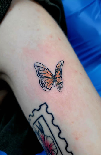 Explore fire tattoo ideas, creative tattoo ideas in Benton, available at Spectrum Tattoo