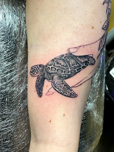 Explore father daughter matching tattoo ideas, creative tattoo ideas in Warner Robins, available at Untold Pain Tattoo Studio