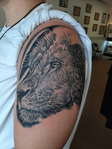 Explore female side tattoo ideas, creative tattoo ideas in Lakeview, available at Backwoods Tattoo Studio