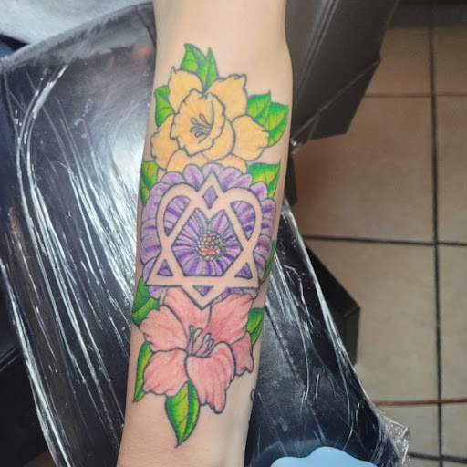 Tattoo Shop «Romantic Torture Tattoo», reviews and photos, 3501 Capital Blvd, Raleigh, NC 27604, USA