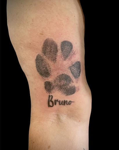 Explore tattoo ideas on ribs for guys, creative tattoo ideas in Hampton, available at Foley Inkd Tattoo Studio