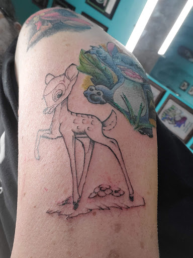 Explore caterpillar tattoo ideas, creative tattoo ideas in Council Bluffs, available at Lil Bros Tattoo