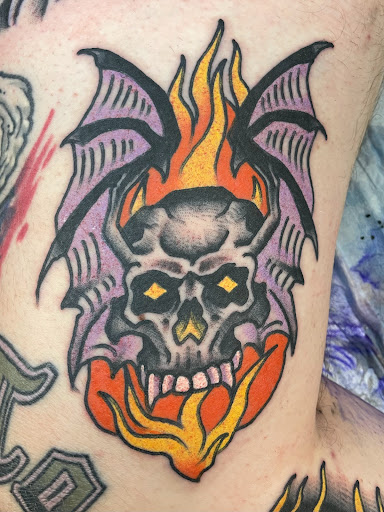 Explore polka trash tattoo ideas, creative tattoo ideas in Delmar, available at Resolute Tattoo