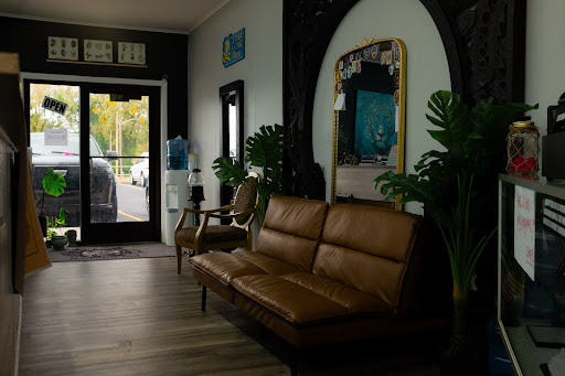 Explore silver lining tattoo ideas, creative tattoo ideas in Peoria, available at Mixed Personalities Tattoo Studio