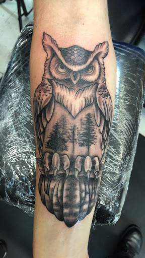 Explore arm sleeve tattoo ideas for men, creative tattoo ideas in San Antonio, available at Nite Owl Tattoo Studio