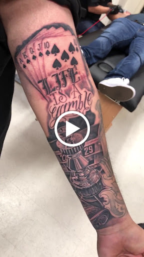 Explore dirtbike tattoo idea, creative tattoo ideas in San Diego, available at Wylde Sydes Tattoo & Body Piercing