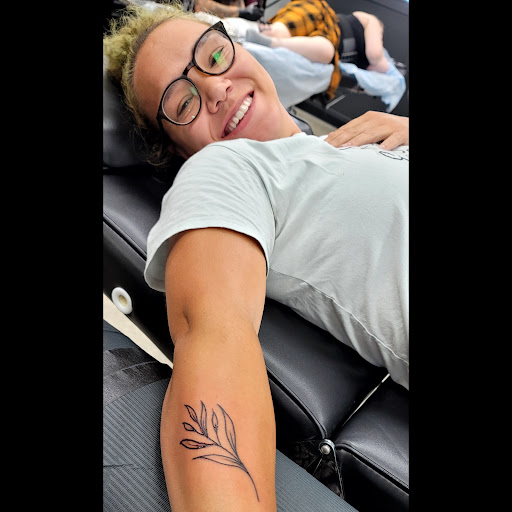 Explore deadpool tattoo ideas, creative tattoo ideas in Lees Summit, available at The Cherry Bomb Tattoo Co.