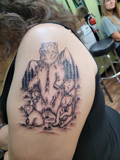 Explore tattoo ideas for men neck, creative tattoo ideas in Austin, available at Moms Tattoos