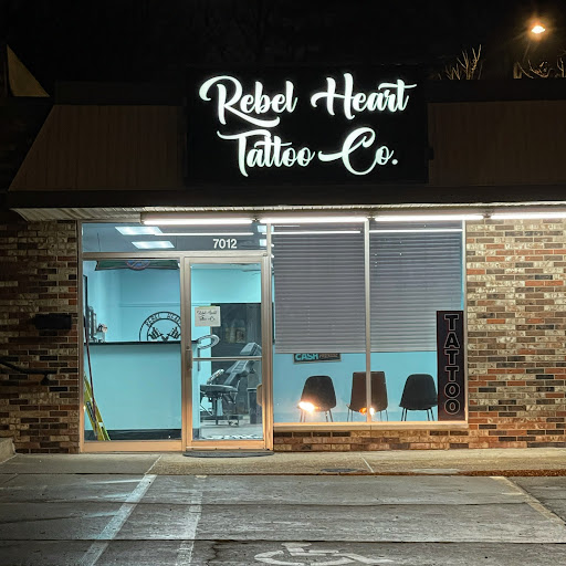 Explore snowboarding tattoo ideas, creative tattoo ideas in Peoria, available at Rebel Heart Tattoo Co.