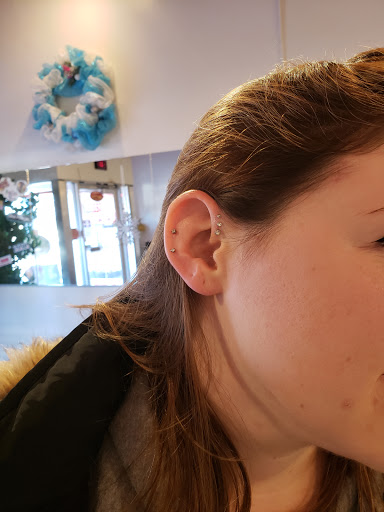 Explore medium tattoo ideas for men, creative tattoo ideas in Green Bay, available at Colourbox Body Piercing Llc