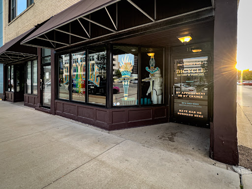 Explore sleeve tattoo ideas for ladies, creative tattoo ideas in South Bend, available at Mystic Union Tattoo & Piercing