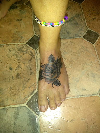 Explore hibiscus flower tattoo ideas, creative tattoo ideas in Hebron, available at Explosive Ink Tattoo