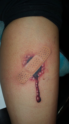 Explore bart and lisa tattoo ideas, creative tattoo ideas in Foley, available at Black Sheep Custom Tattoos and Piercings