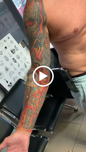 Explore colored tattoo ideas for men, creative tattoo ideas in Sarasota, available at SEVEN SINS Tattoo Studio