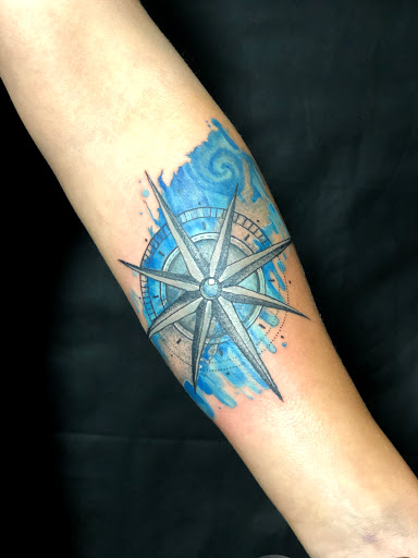 Explore floral hand tattoo ideas, creative tattoo ideas in Syracuse, available at Perfect Storm Tattoo