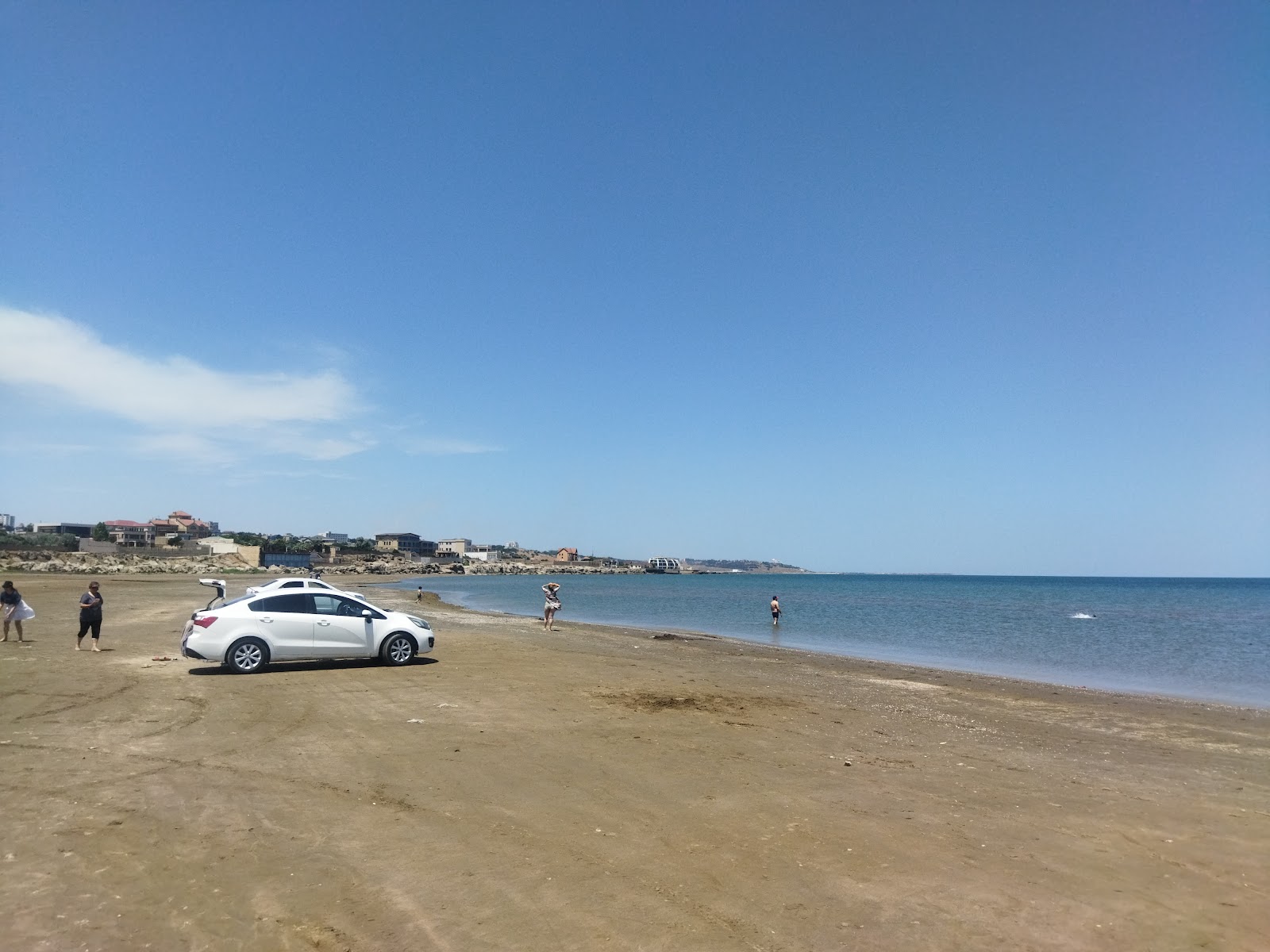 Foto di Buzovna Cimerliyi con una superficie del sabbia beige