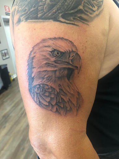 Explore tattoo cross ideas, creative tattoo ideas in Crossville, available at Living Canvas Tattoo