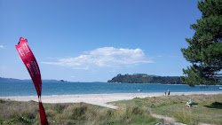 Foto av Cooks Beach och bosättningen