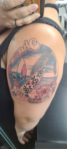 Explore microphone tattoo ideas, creative tattoo ideas in Twentynine Palms, available at Hilltop Tattoo Company