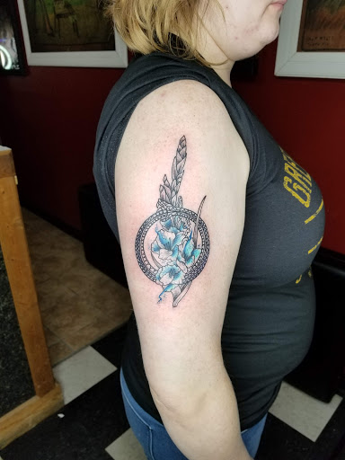 Explore tulip tattoo ideas, creative tattoo ideas in Stevens Point, available at Mothers Approval Tattooing