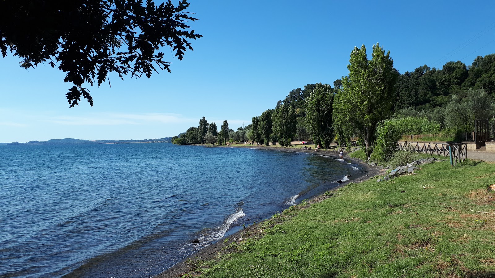 Foto van Spiaggia dell'Acetosa met turquoise water oppervlakte