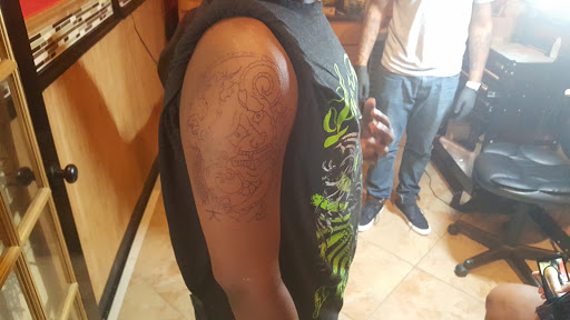 Tattoo Shop «Rock N Roll Tattoo & Piercing», reviews and photos, 6311 Glenwood Ave, Raleigh, NC 27612, USA