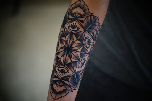 Find dragon tattoo ideas for your next unique tattoo in Clinton at Black Relic Tattoo