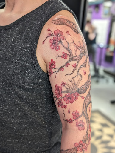 Explore last name tattoo ideas on arm, creative tattoo ideas in Goshen, available at Lady Luck Studio