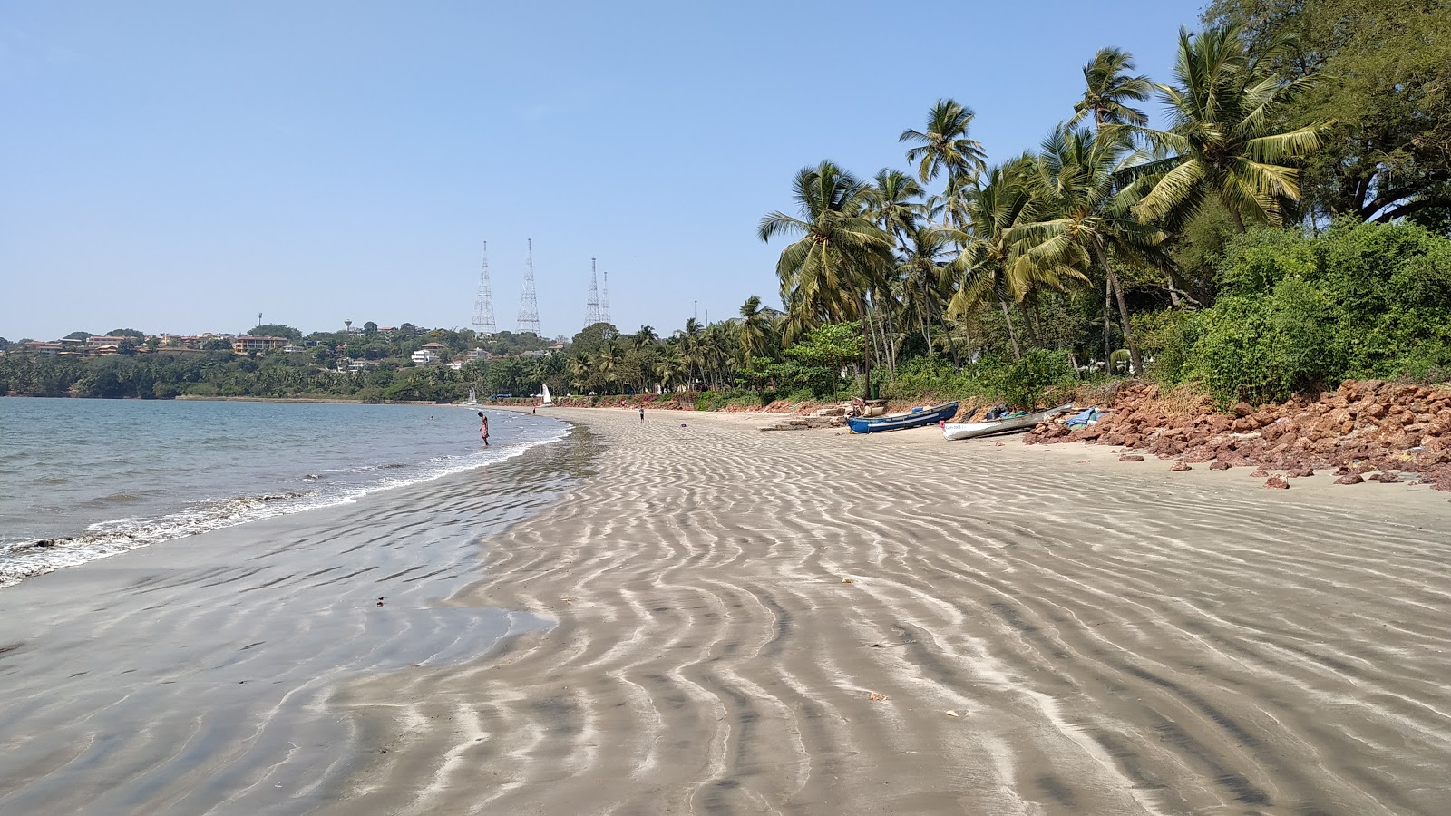 Photo of Bambolim Beach with bright sand surface