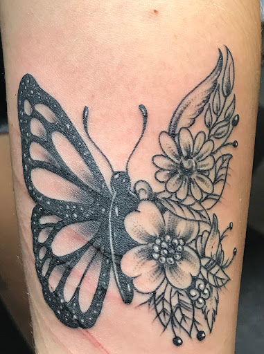 Explore lv tattoo ideas, creative tattoo ideas in Nampa, available at Temptation Tattoo & Body Piercing