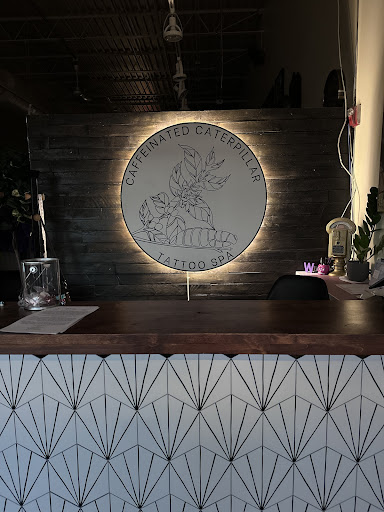 Explore first son tattoo ideas, creative tattoo ideas in Omaha, available at Caffeinated Caterpillar Tattoo Spa