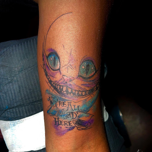 Explore female full back tattoo ideas, creative tattoo ideas in Saginaw, available at Express Yourself Tattoos & Piercings