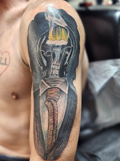 Explore tattoo ideas for rip, creative tattoo ideas in Spokane, available at Platinum Rose Tattoo Studio