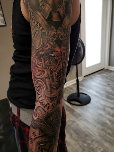 Explore november birth flower tattoo ideas, creative tattoo ideas in Linn Creek, available at Hillard Skillard Tattoos, LLC.